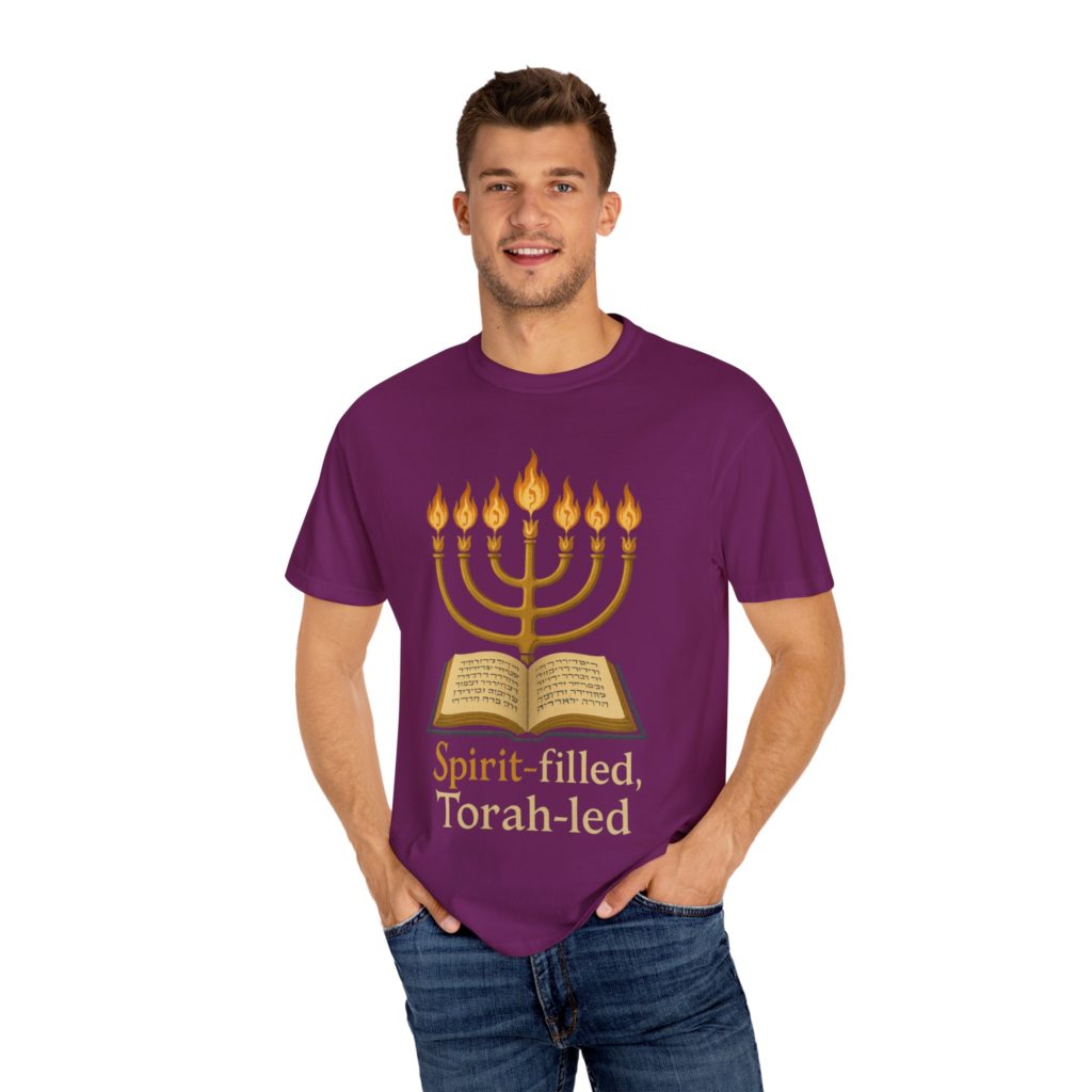 Spirit-Filled Torah-Led T-shirt with seven-branch menorah and open scroll artwork.