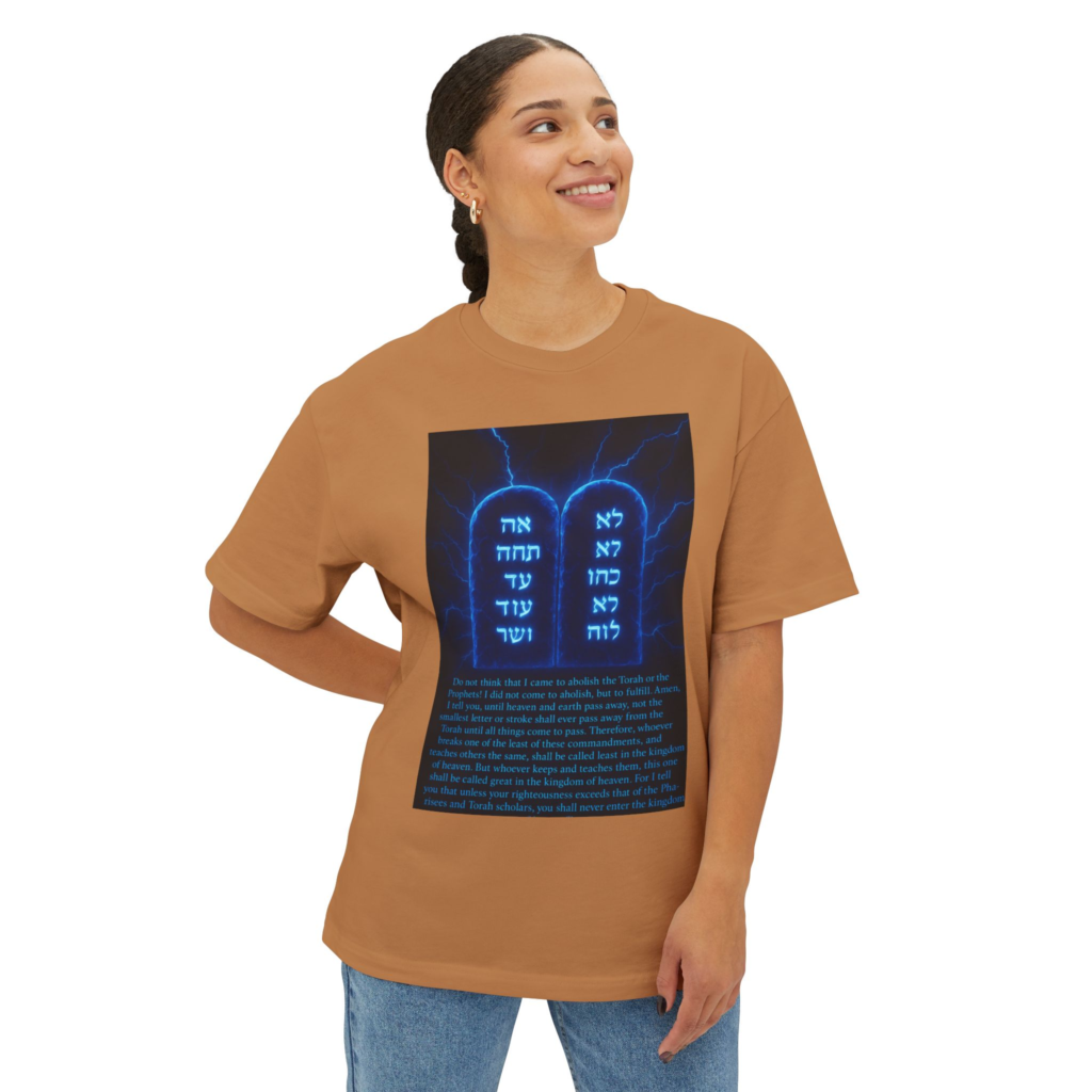 Torah Not Abolished T-shirt with blue commandment tablets, Hebrew lettering, and Matthew 5 Scripture artwork.